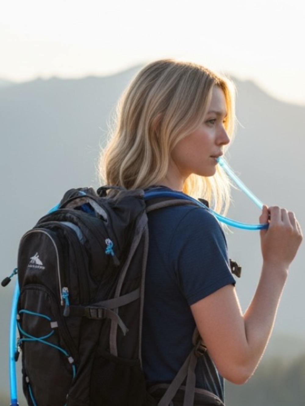 High Sierra Black Backpack with Blue Accents and Hydration Tube